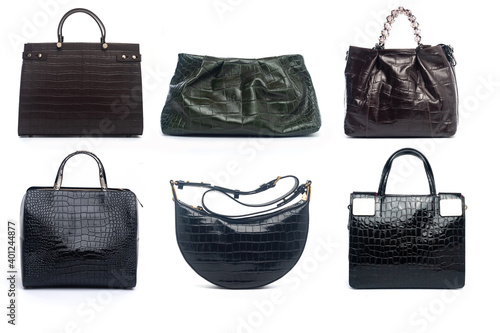 set of black crocodile skin handbags isolated on white background (ID: 401244877)