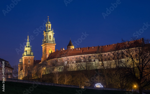 Old Krakow famous Wawel Royal Castle landmark twilight image in the Poland. Traveling concept image.