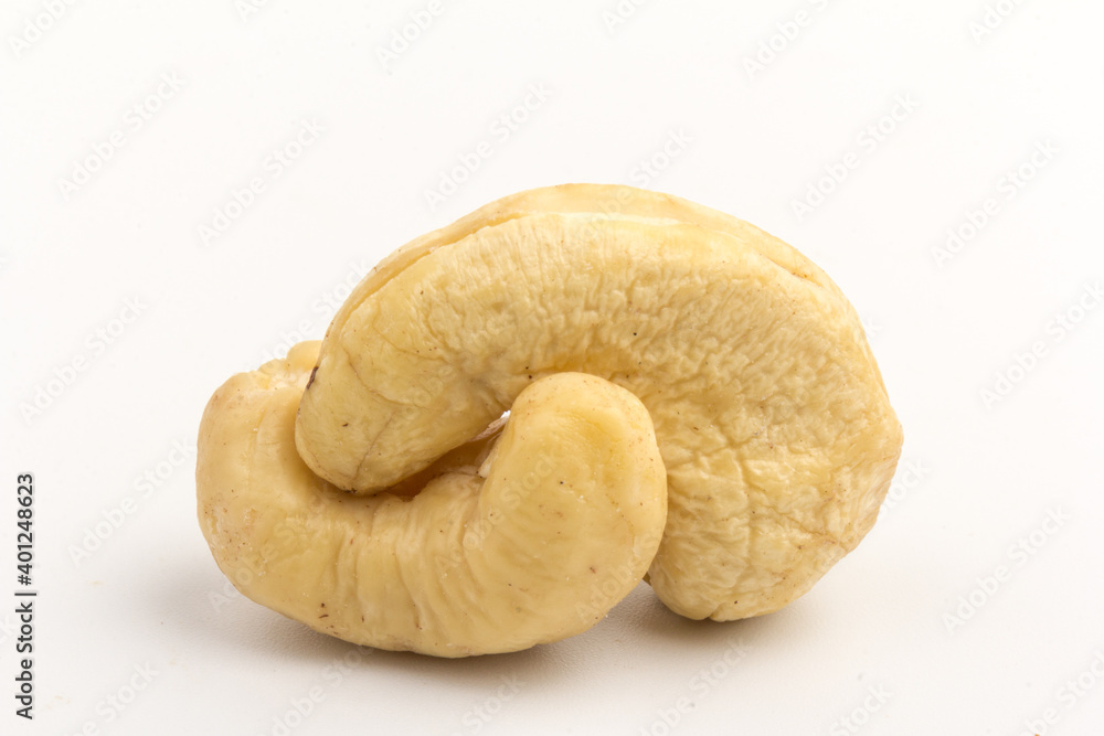 Fototapeta premium Raw cashew nuts isolated on white background.