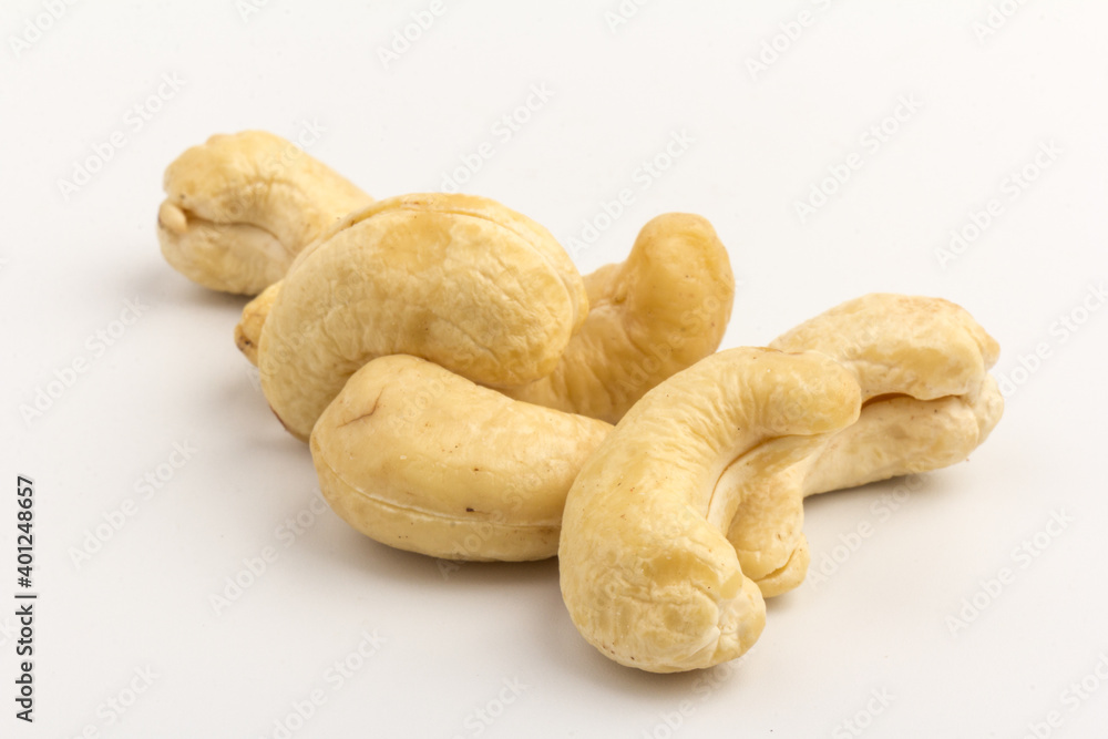 Raw cashew nuts isolated on white background. Raw cashew nuts isolated on white background.