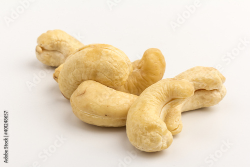 Raw cashew nuts isolated on white background.