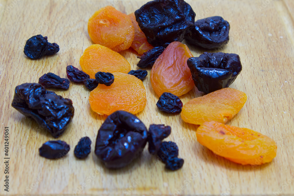 dried fruits lie on the board dried fruits lie on the board