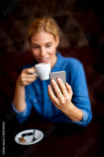Pretty young woman sitting ...