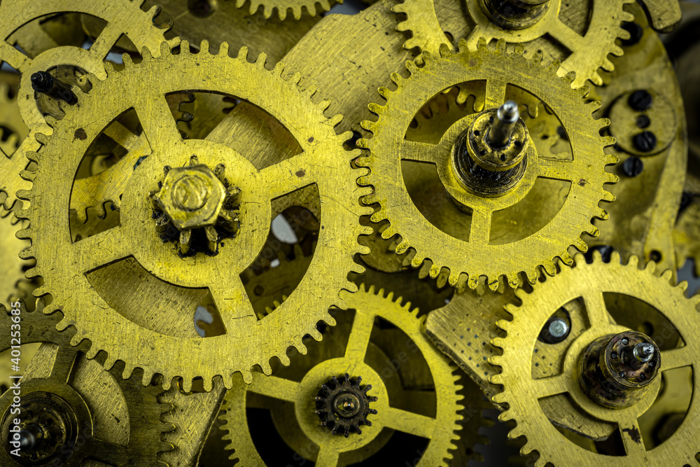 Cog-wheels from the bronze of unworking mechanism as a background. Cog-wheels from the bronze of unworking mechanism as a background.