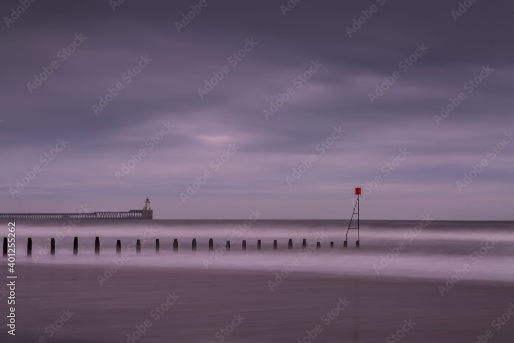 A stormy, cloudy and blustery day at Blyth beach in Northumberland, as the waves batter the coast