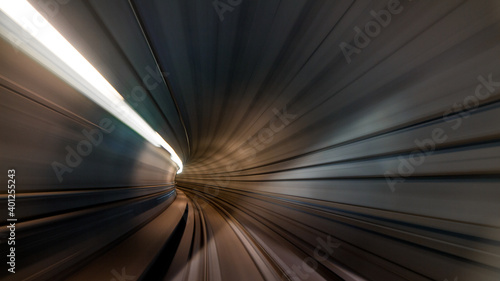 Fast moving train in tunnel