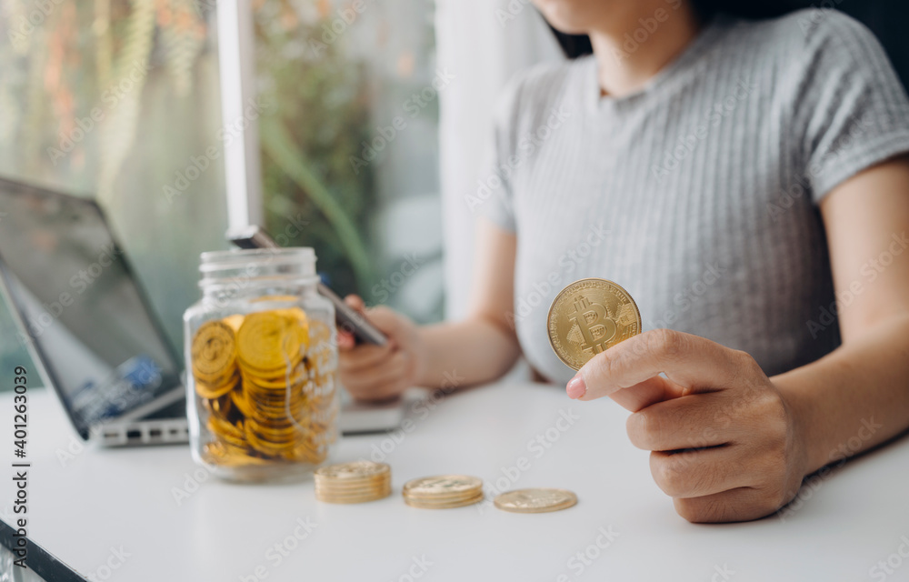 Healthcare costs and fees concept.Hand of smart doctor used a calculator for medical costs in modern hospital Healthcare costs and fees concept.Hand of smart doctor used a calculator for medical costs in modern hospital