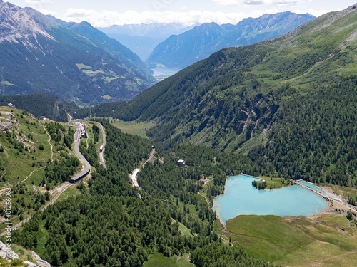 Panoramic view of Alpe Grum, Lago Palu, Lago di Poschiavo in the Canton of Grisons, Switzerland photo