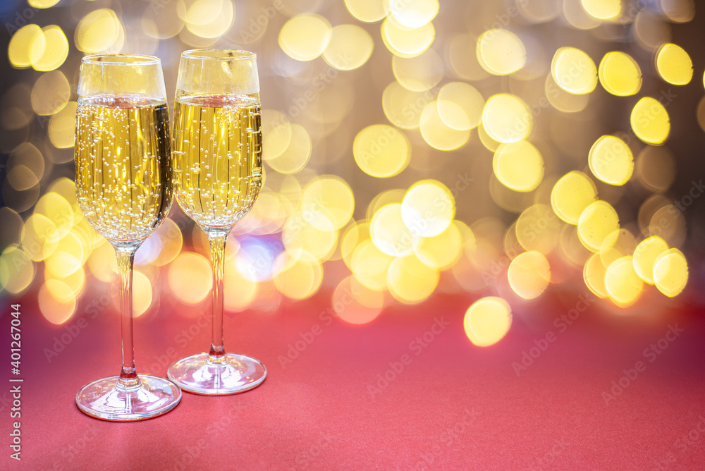 Champagne glasses on bokeh lights background Champagne glasses on bokeh lights background