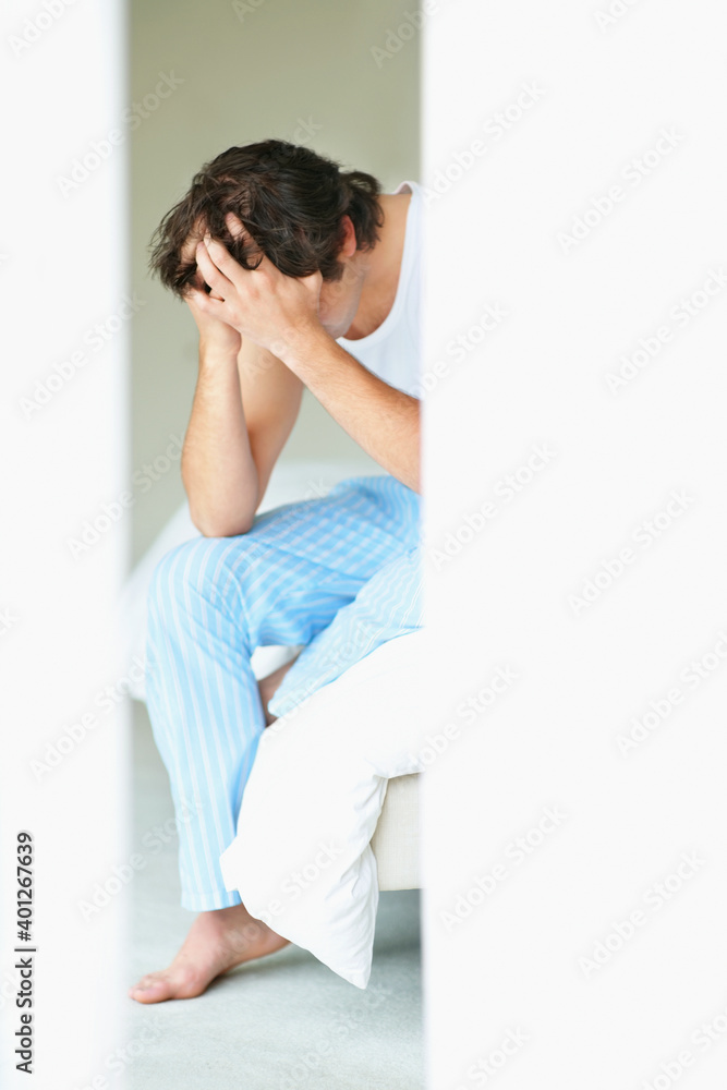 Frustrated man holding his head in his hands Frustrated man holding his head in his hands