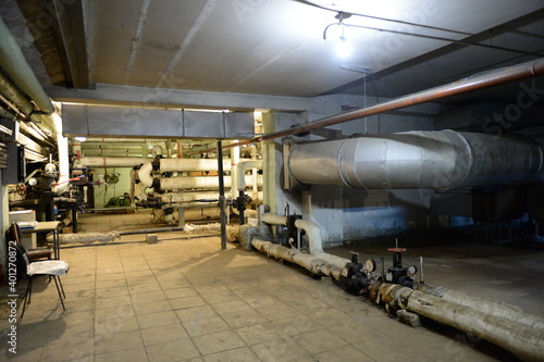 Heating pipes in the basement of the building