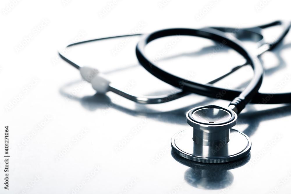black stethoscope for medical examination on medical laboratory health table background black stethoscope for medical examination on medical laboratory health table background