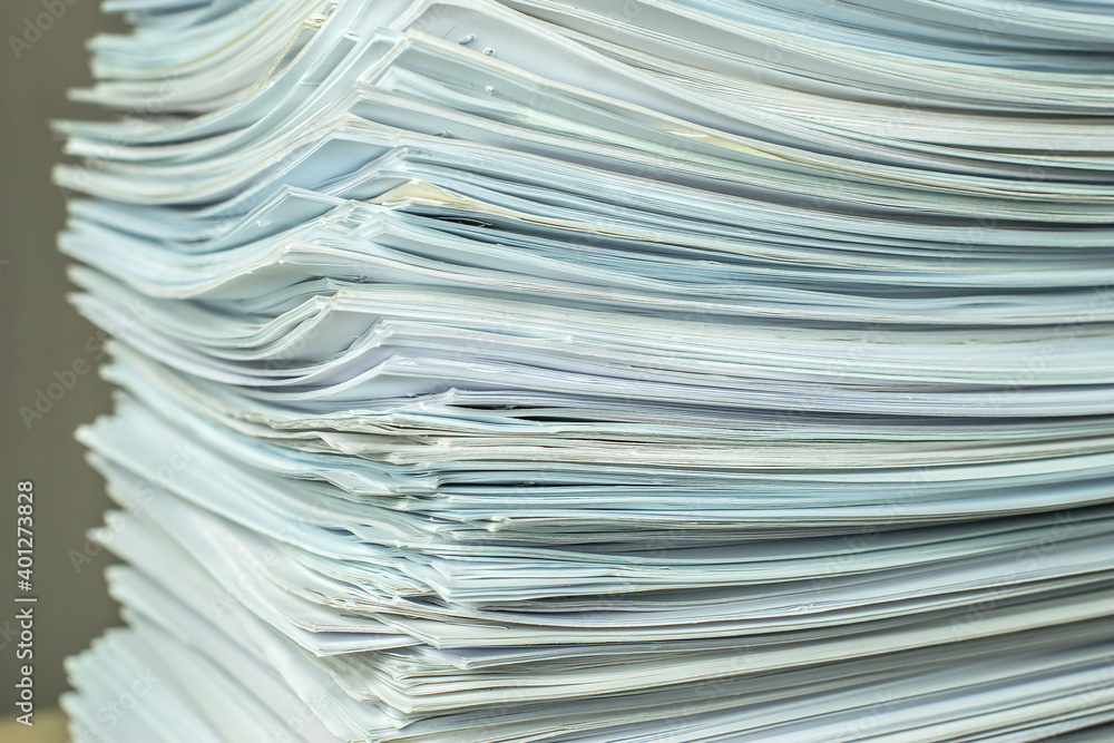 bundles bales of paper documents. stacks packs pile on the desk in the office bundles bales of paper documents. stacks packs pile on the desk in the office