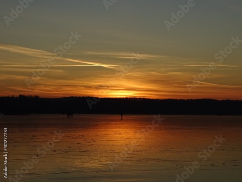 sunset on the frozen lake © Anna