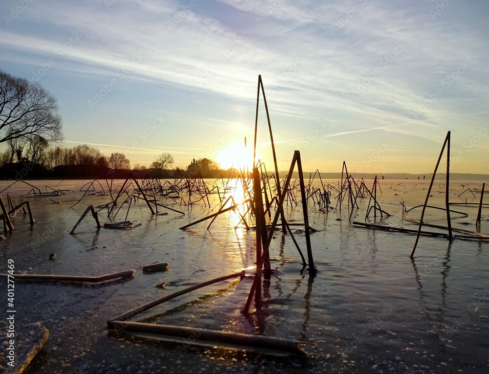 sunset on the frozen lake