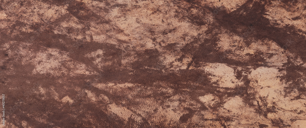 background and texture of old dark yellow-brown leather