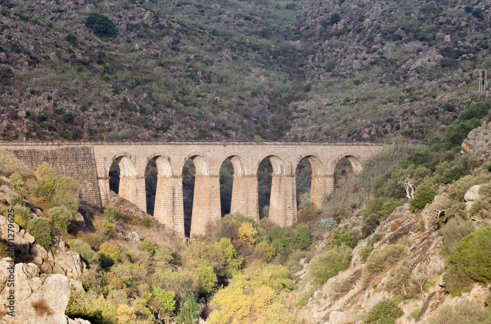 Aqueduct bridge of the abandoned train over the Jerte river as it passes through the city of Plasencia