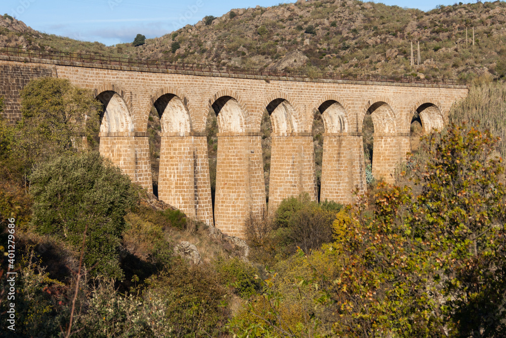 Aqueduct bridge of the abandoned train over the Jerte river as it passes through the city of Plasencia Aqueduct bridge of the abandoned train over the Jerte river as it passes through the city of Plasencia