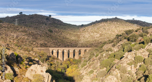 Aqueduct bridge of the abandoned train over the Jerte river as it passes through the city of Plasencia