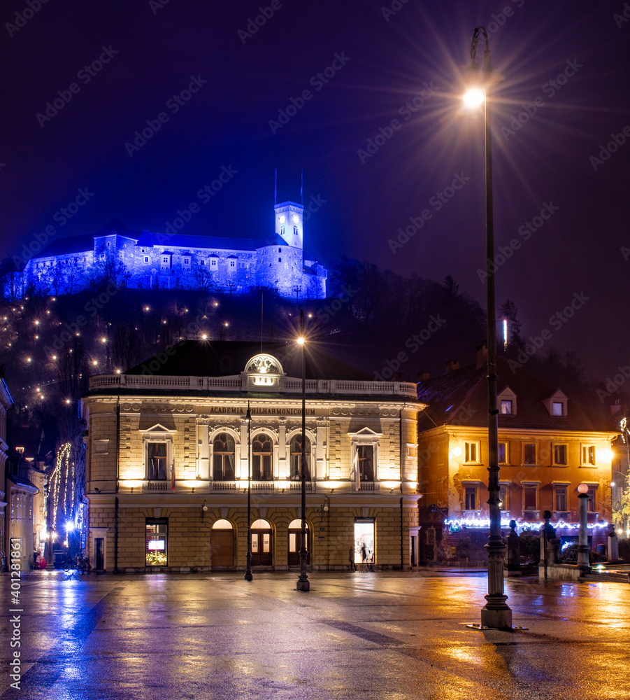 Naklejka premium Ljubljana castle above Ljubljana Philharmony building, Central Slovenia Region