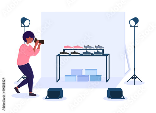 Female photographer in studio doing sneakers commercial photography. Concept of professional commercial shoot with camera, lights, background and reflectors. Flat cartoon vector illustration