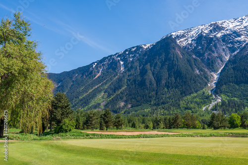 Golf course with gorgeous green and fantastic montain view.