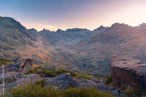 Scenery view of shabby mounts under colorful sky at sundown in Sierra de Gredos