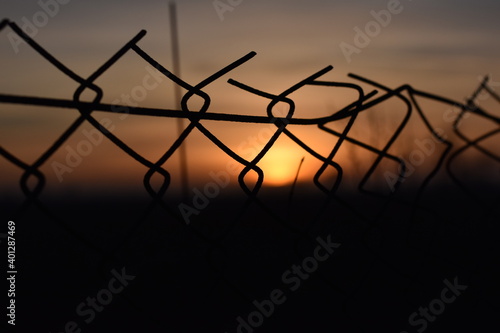 Sunset in fence