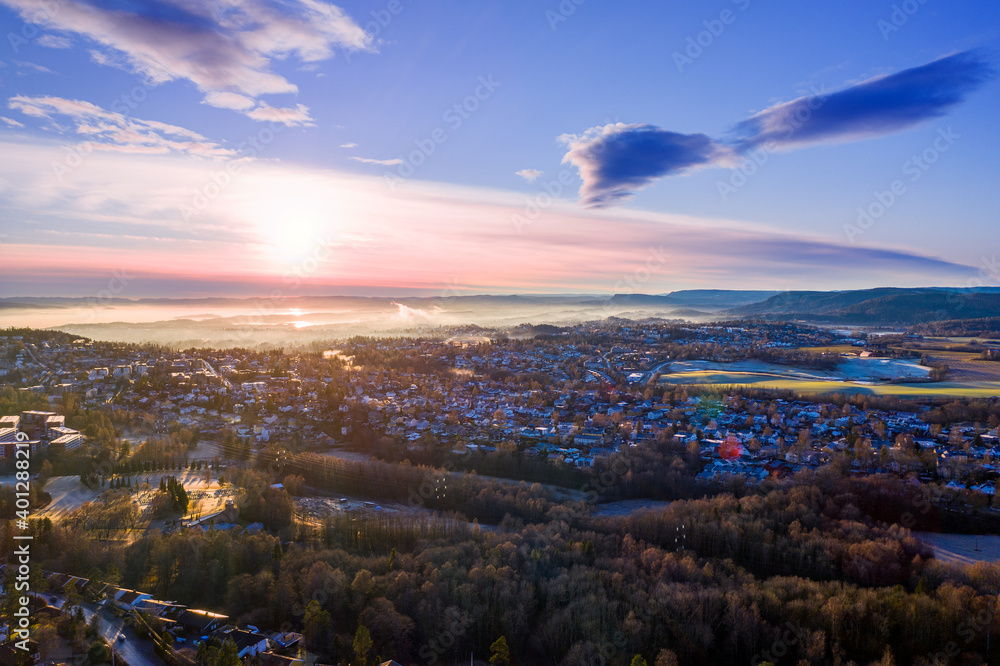 Fototapeta premium HDR or High Definition Ratio shot of Oslo, Norway. The sun is creating amazing light and colors. The photo is several photos merged together to bring out the high and low lights. 