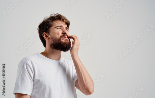 bearded man health problems dental pain medicine isolated background