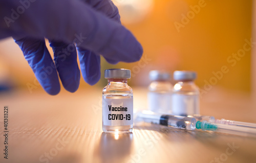 Coronavirus, Covid 19 virus, vaccine vial. Vaccine phial with transparent fluid for coronavirus covid-19. photo