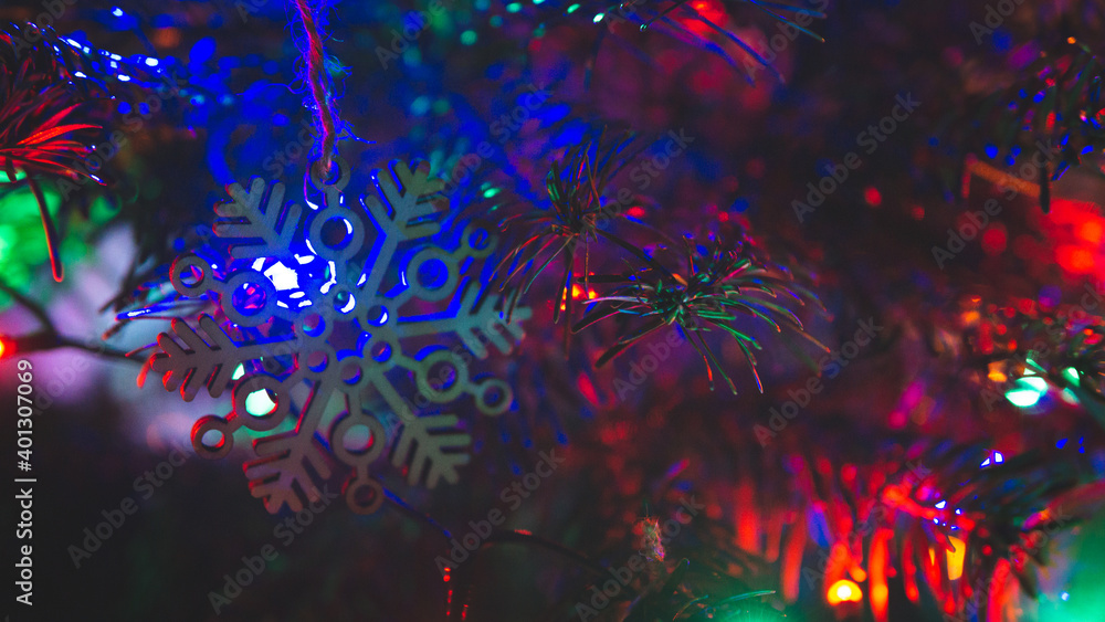 Christmas decorations at christmas tree with blurred RGB lights - obrazy, fototapety, plakaty 