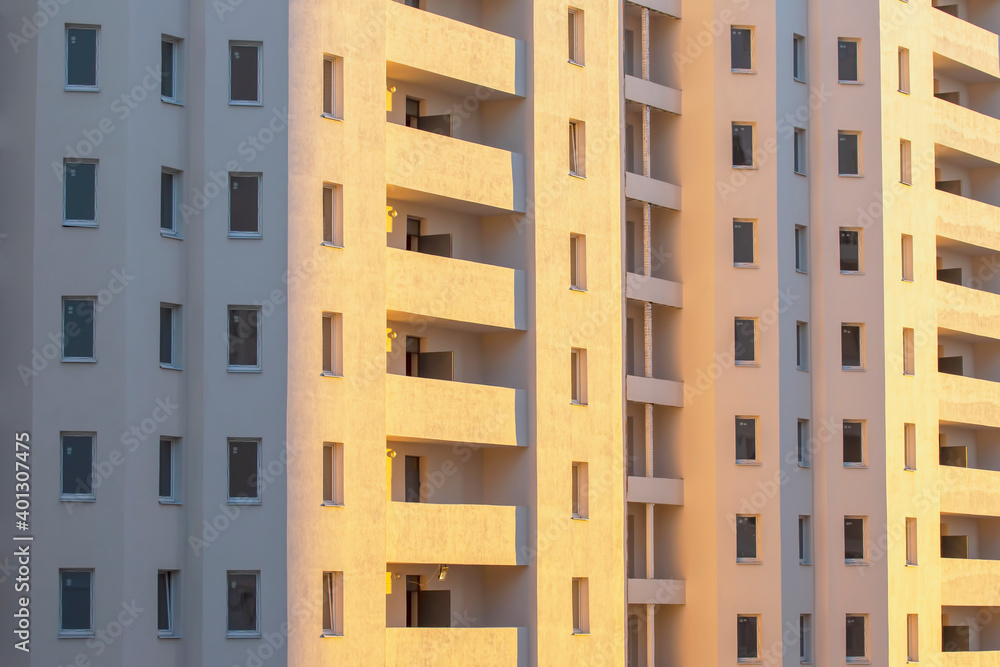 Facade of a new multi-story residential building. architecture and modern construction Facade of a new multi-story residential building. architecture and modern construction