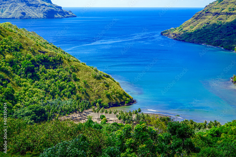 Naklejka premium French Polynesia, Marquesas, Nuku Hiva Island. Panoramic view on Hakapaa Bay.