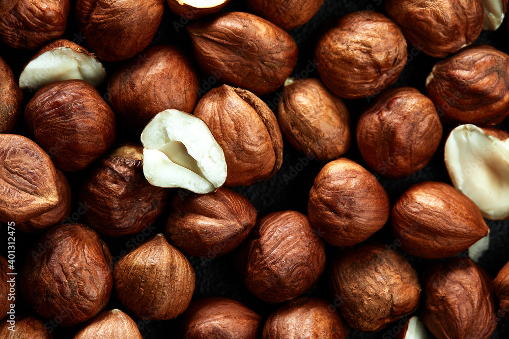 Close up of Hazelnut kernels - Food Frame Background, macro detailed close up. Close up of Hazelnut kernels - Food Frame Background, macro detailed close up.
