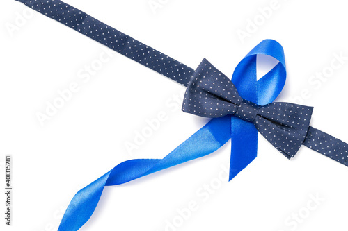 Blue prostate ribbon. Awareness prostate cancer of men health in November. Blue ribbon, fashion bowtie isolated on white background. November and International Mens Day.