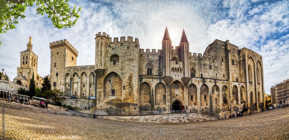 The Papal Palace in Avignon, the former residence of the Pope in France - a historical and architectural monument, France, a UNESCO World Heritage Site and one of the largest palaces in Europe, HDR. The Papal Palace in Avignon, the former residence of the Pope in France - a historical and architectural monument, France, a UNESCO World Heritage Site and one of the largest palaces in Europe, HDR.