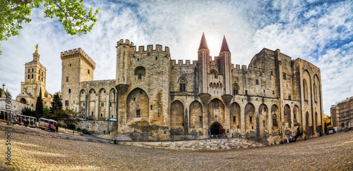 The Papal Palace in Avignon, the former residence of the Pope in France - a historical and architectural monument, France, a UNESCO World Heritage Site and one of the largest palaces in Europe, HDR.