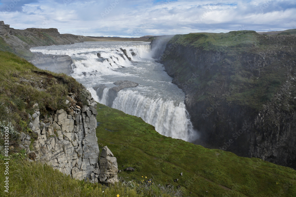 Visitors follow the Trail of Sigridur to an overlook above Gullfoss (Golden Falls) on the Hvita River in Iceland. Visitors follow the Trail of Sigridur to an overlook above Gullfoss (Golden Falls) on the Hvita River in Iceland.