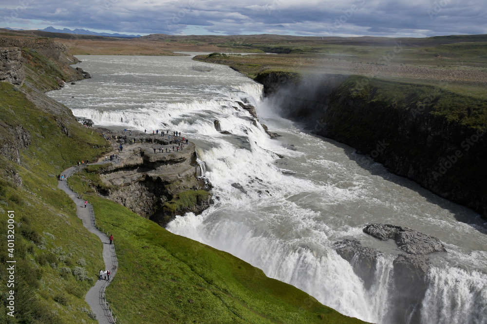 Visitors follow the Trail of Sigridur to an overlook above Gullfoss (Golden Falls) on the Hvita River in Iceland.