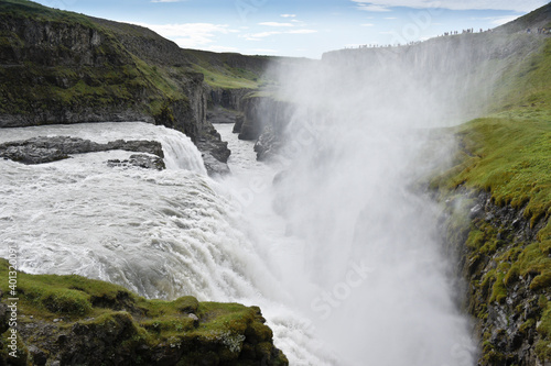 The Hvita River plunging over a cliff at Gullfoss  Golden Falls   Iceland