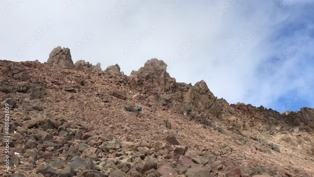 Mountaineers climbing at Mount Savalan (Sabalan) summit in Savalan, Iran. Savalan is the third highest mountain in Iran. It’s 4811 meters altitude. Mountaineers climbing at Mount Savalan (Sabalan) summit in Savalan, Iran. Savalan is the third highest mountain in Iran. It’s 4811 meters altitude.