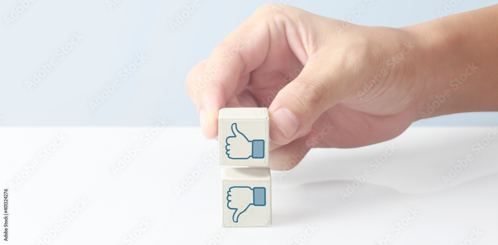 Concept creative idea innovation. cube block in hand with symbol Concept creative idea innovation. cube block in hand with symbol