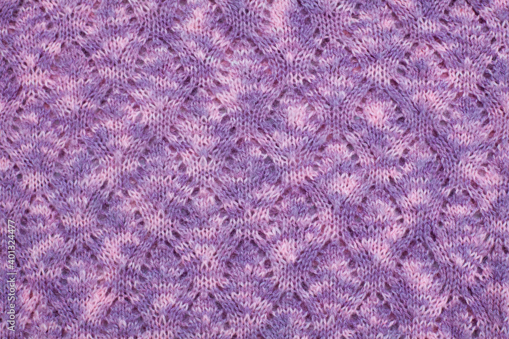 Mixed filigree knitted canvas in light purple colors, handmaid, needlwork, clousup., horizontal photo