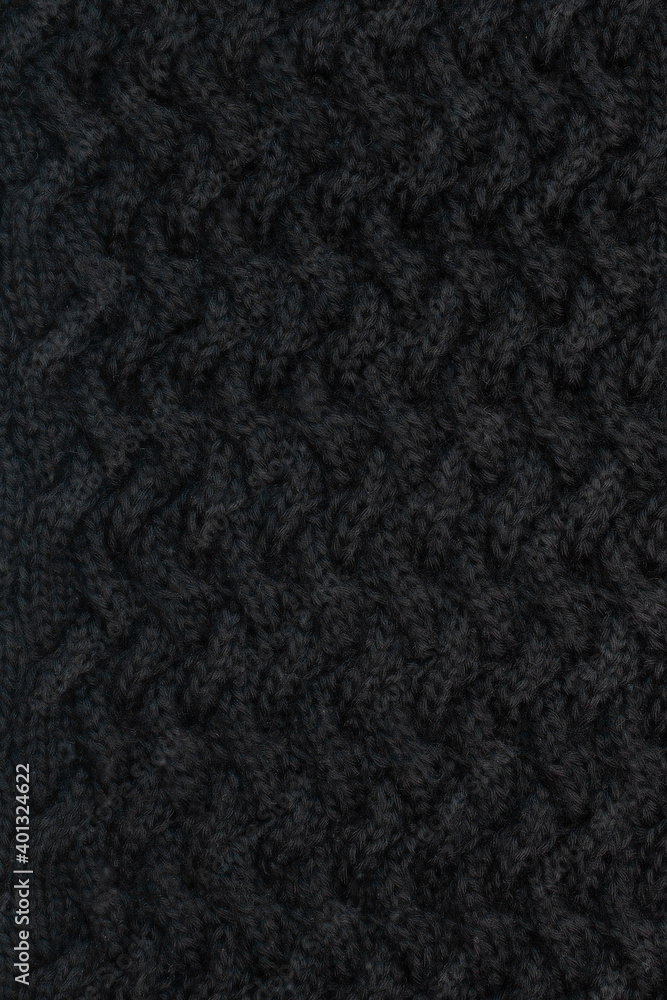 Fototapeta premium Black wool knitted fabric, hand knit, pattern, rib