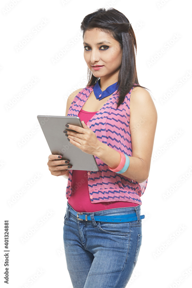 Fototapeta premium Attractive cheerful young women with digital tablet