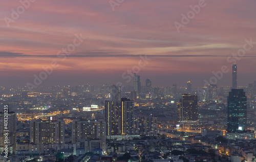 Bangkok  thailand - Dec 23  2020   Bangkok downtown cityscape in Business district with bright glowing lights at night give the city a modern style. No focus  specifically.