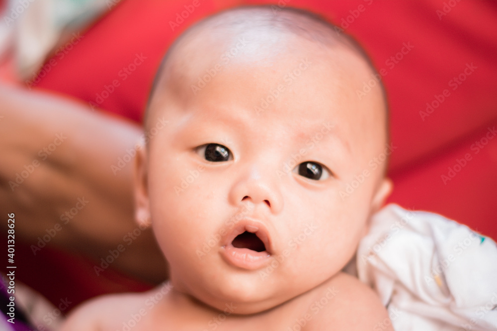 Portrait of new born baby boy resting in mothers arms,family concept,cose up. Portrait of new born baby boy resting in mothers arms,family concept,cose up.