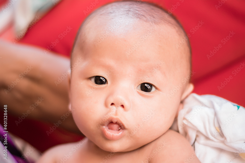 Portrait of new born baby boy resting in mothers arms,family concept,cose up. Portrait of new born baby boy resting in mothers arms,family concept,cose up.