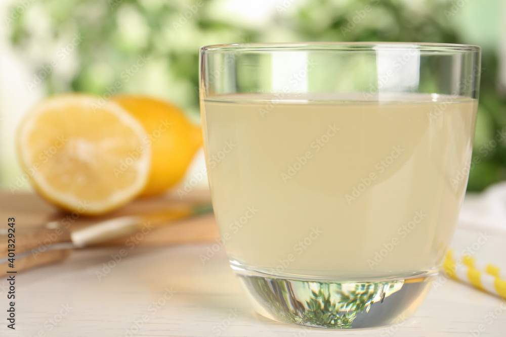 Fototapeta premium Delicious refreshing drink on white wooden table, closeup